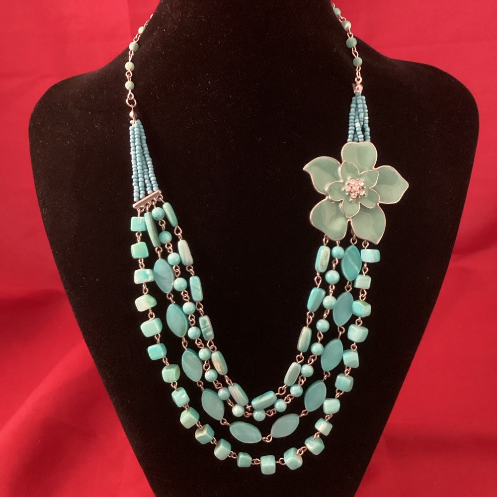 Blue beads with metallic flower asymetric three rows necklace signed JNY
